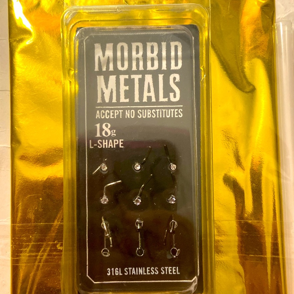 Selling these two packs of piercings together I got them for $32
